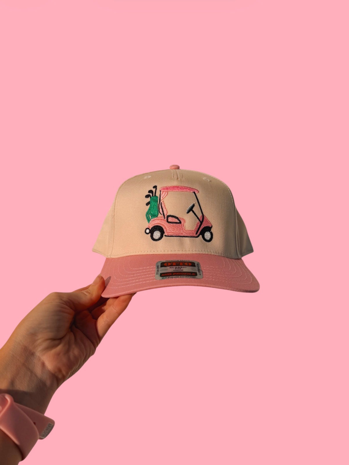 Golf Cart With Green Golf Bag Pink Billed Trucker Hat