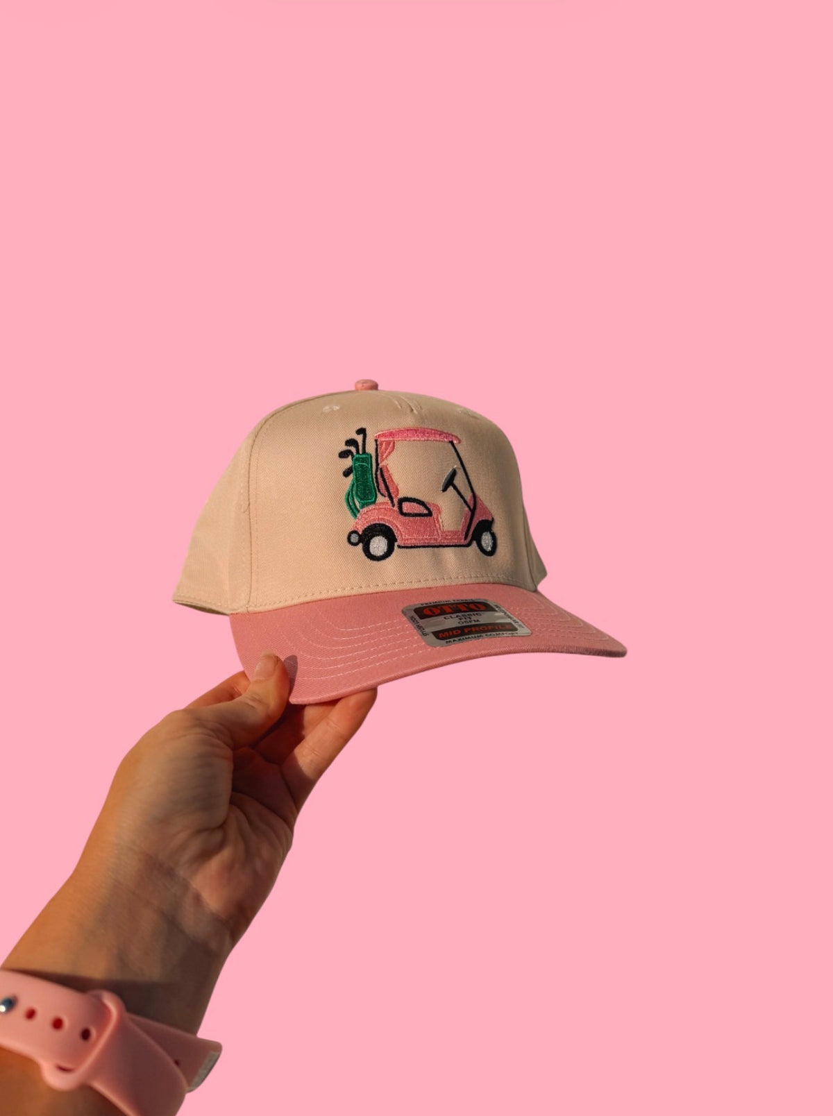 Golf Cart With Green Golf Bag Pink Billed Trucker Hat
